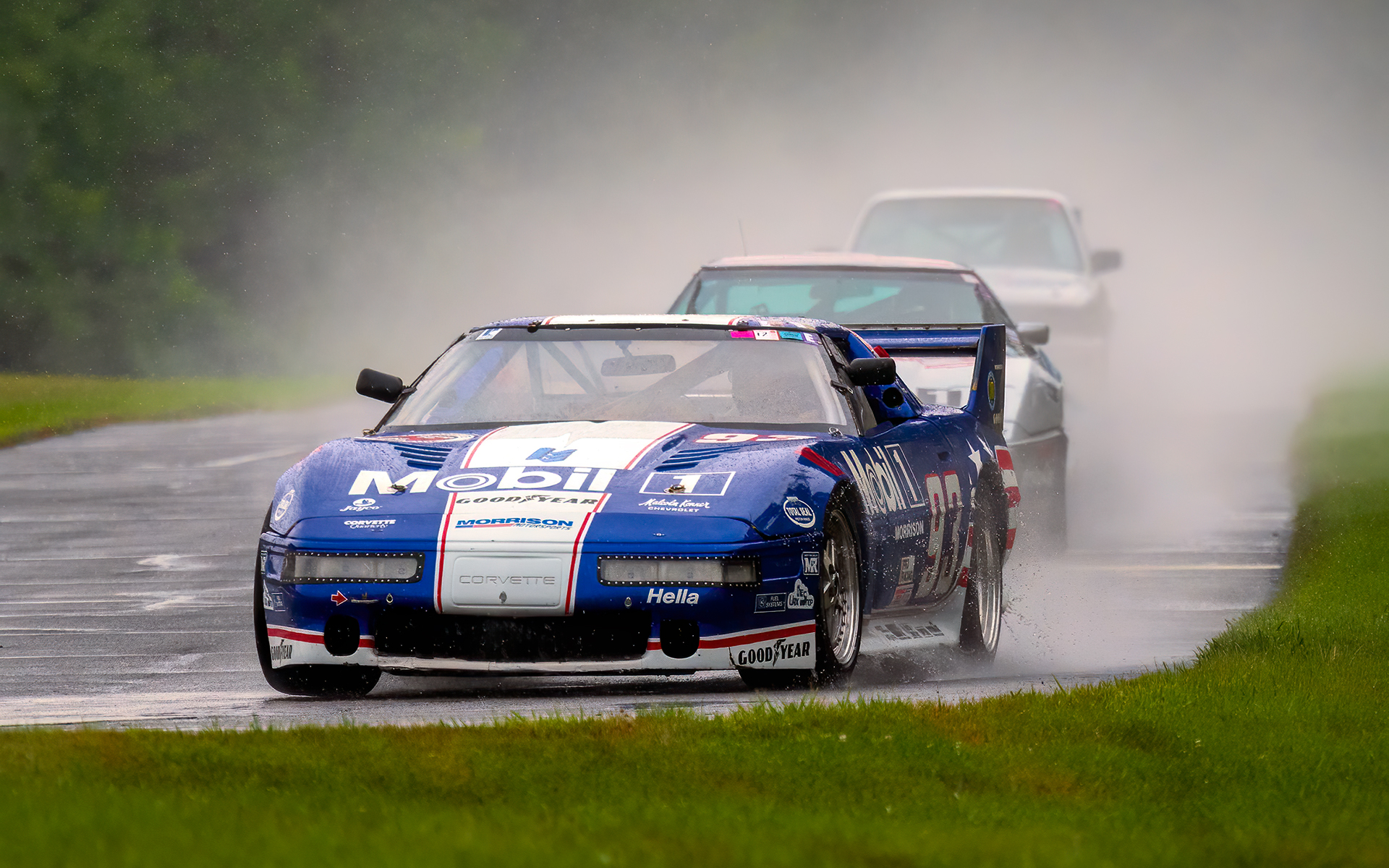 Chevrolet Corvette road racing during a rain storm at Waterford Hills, Michigan : Cars : Dan Sheehan Photographs - Fine Art Stock Photography