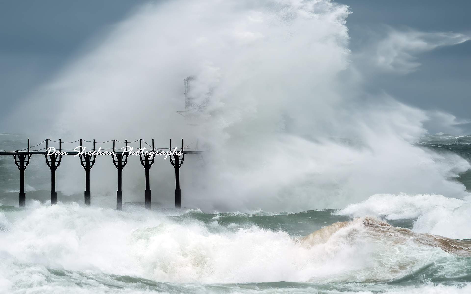 St. Joseph, Michigan outer lighthouse photographed during a violent winter wind storm. Photography during conditions this severe is a physical as well as technical challenge.  : Lighthouses : Dan Sheehan Photographs - Fine Art Stock Photography