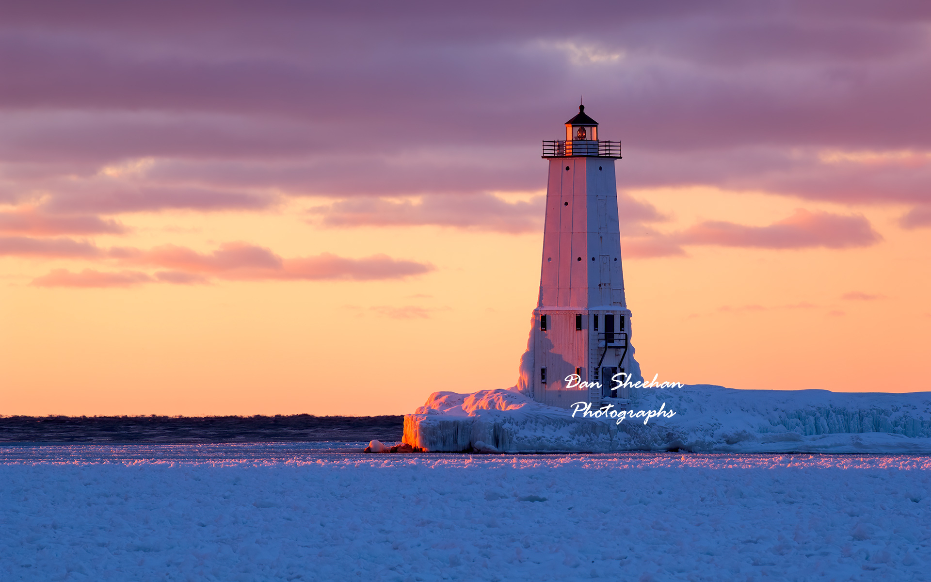 A peaceful winter sunset in Frankfort, Michigan. Volkswagen used this image in a nationwide USA advertisement. : Lighthouses : Dan Sheehan Photographs - Fine Art Stock Photography
